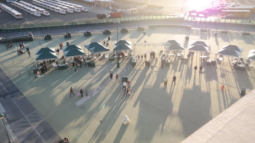 image of green pop up tents used at disneyland resort for security checkpoints 